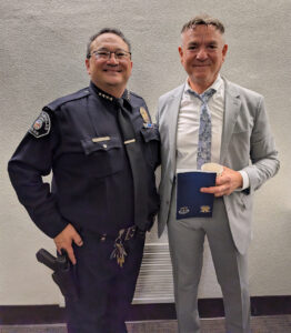 Alumni Donald Graham and retired city attorney Norman Wegener