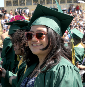 Graduating student with mortar board